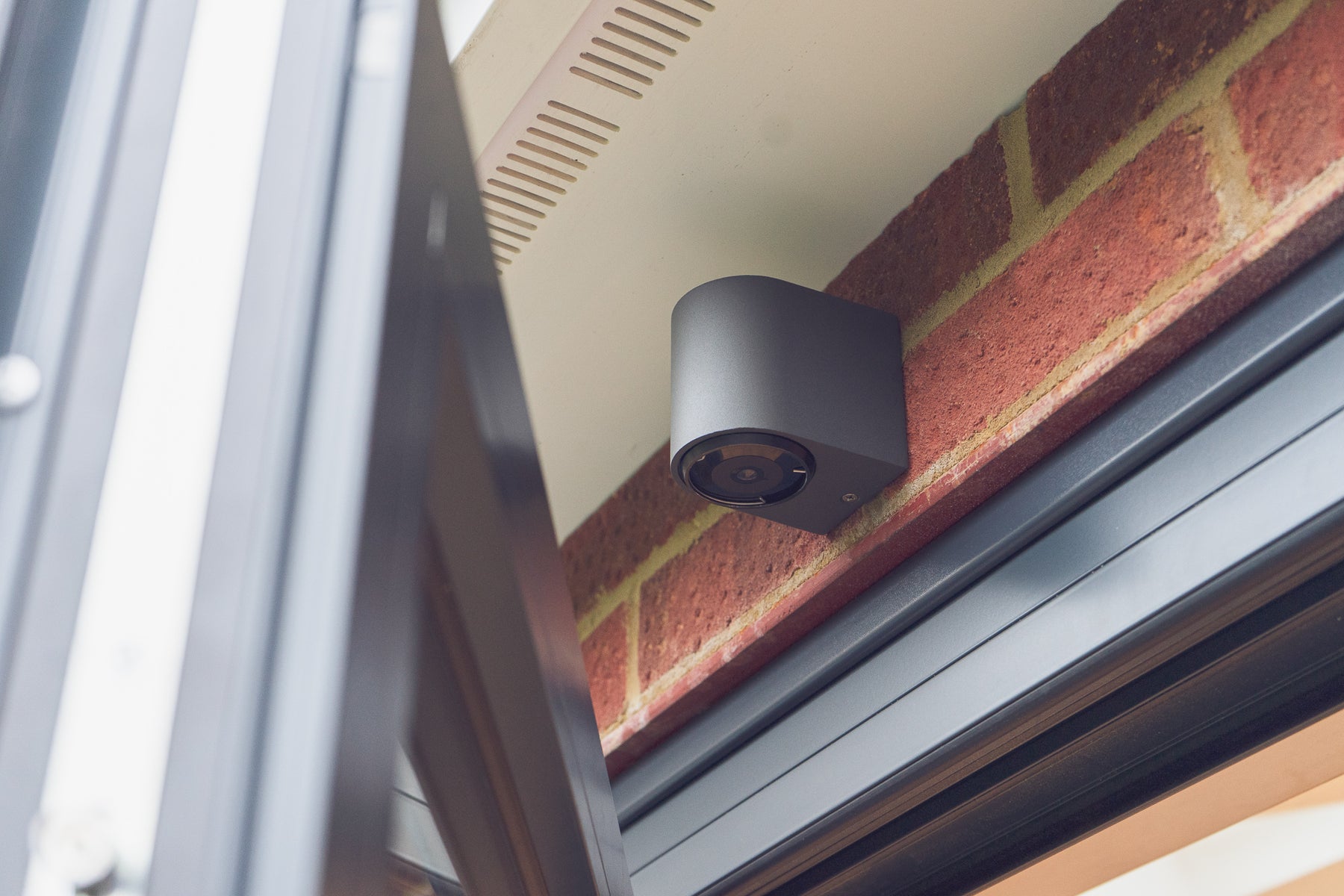 Faradite Sensor wall mount accessory above a door.