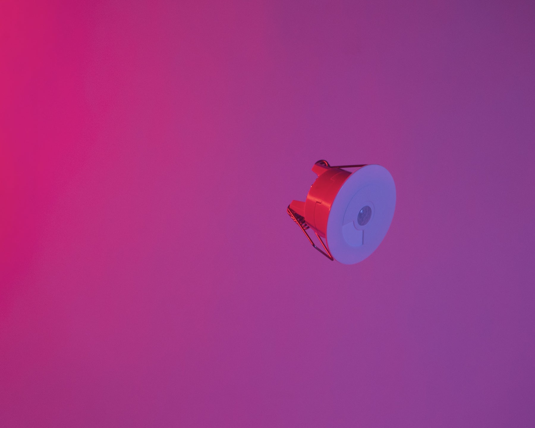 Faradite motion sensor (pir) floating in red space